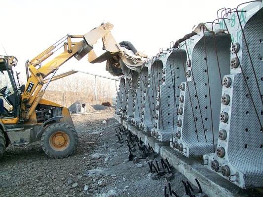 Zastosowanie technologii gruntu zbrojonego do posadowienia przyczółków mostowych